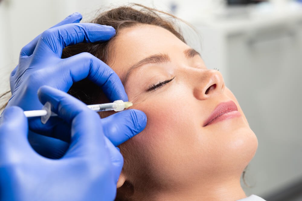 PRP facial and microneedling collagen stimulation at Malouf Dermatology.